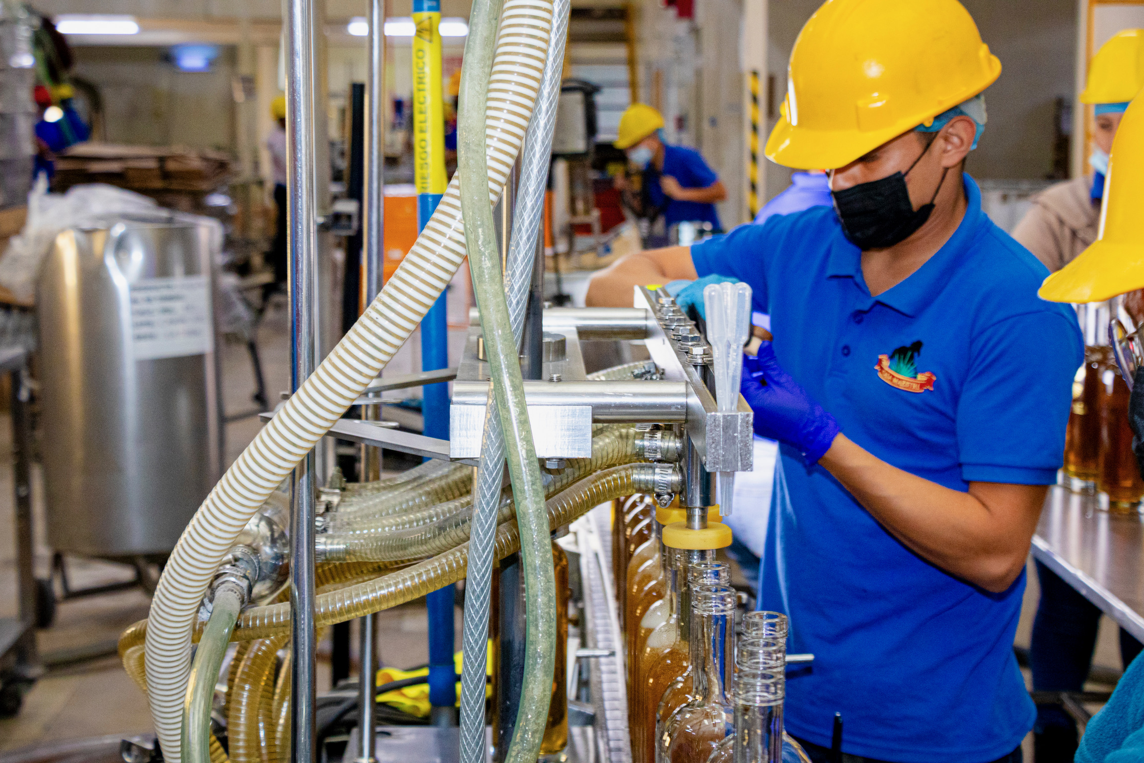 Worker at the filling machine