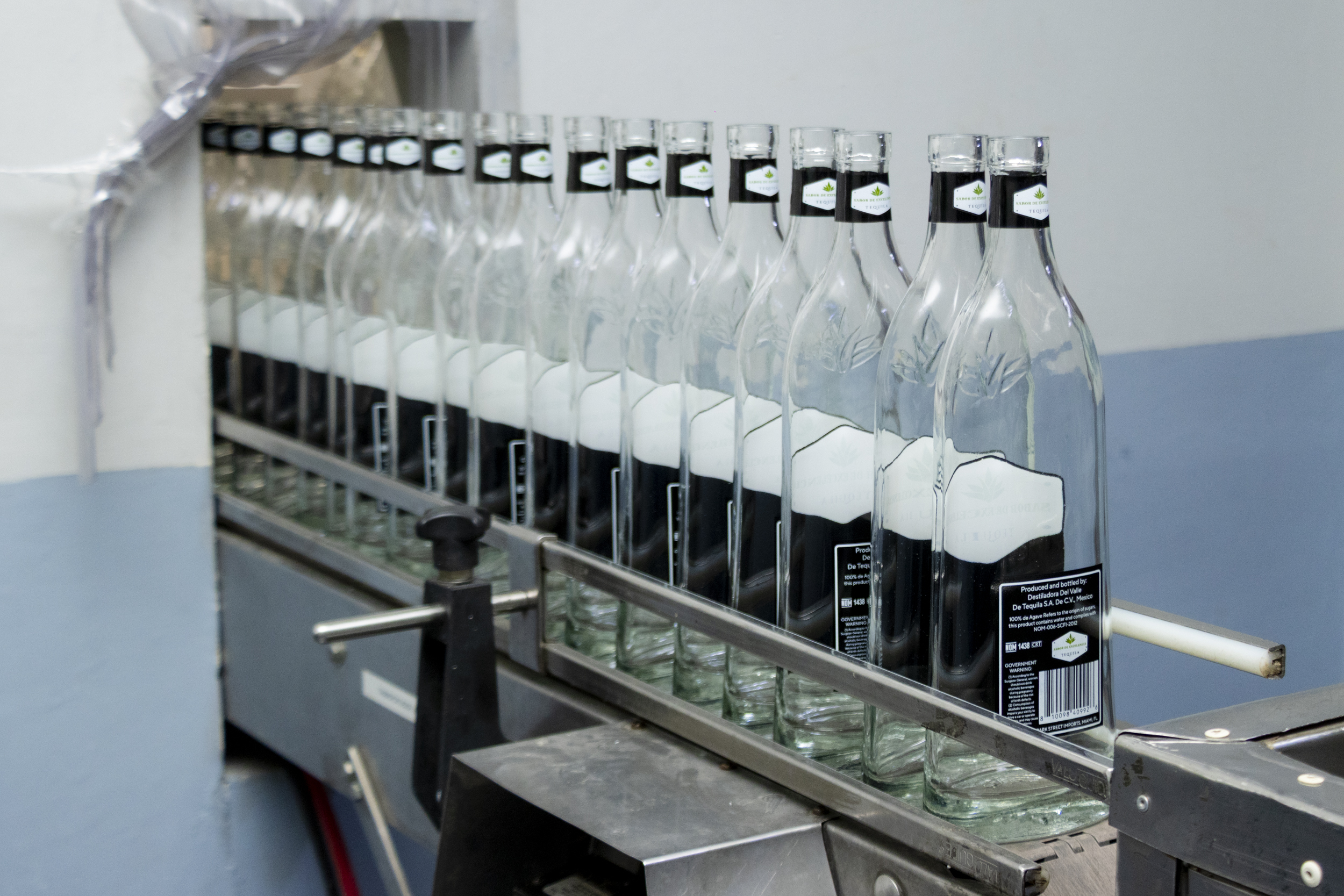 Empty bottles on the bottling line